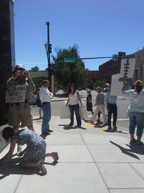 Stop the Frack Attack, Idaho! in Boise, talking with Idaho Department of Lands director Tom Schultz (Helen Yost photo)