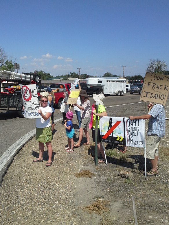 Protesters from across the state and country chant and wave fracking/drilling protest signs at the high-traffic corner of Highways 95 and 30 near Interstate 84 Exit 3 in southwestern Idaho.