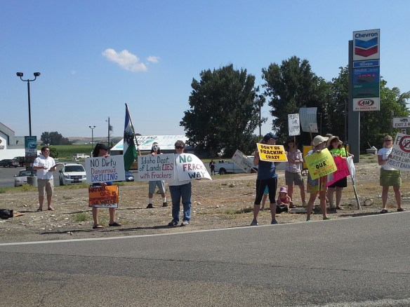 Protesters from across the state and country chant and wave fracking/drilling protest signs at the high-traffic corner of Highways 95 and 30 near Interstate 84 Exit 3 in southwestern Idaho.