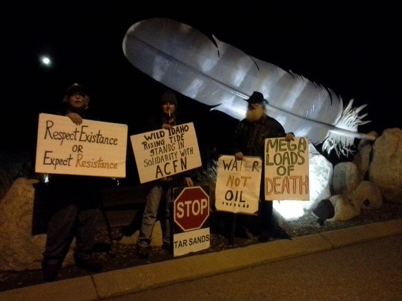 Occupy Bellingham and Spokane Rising Tide protesters of a tar sands megaload moving on Northwest Boulevard in Coeur d'Alene, Idaho, on Monday, November 11